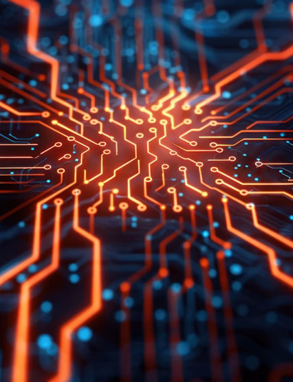 A glowing computer processor on a circuit board. A close-up the intricate details of the technology are highlighted by the warm, orange light.