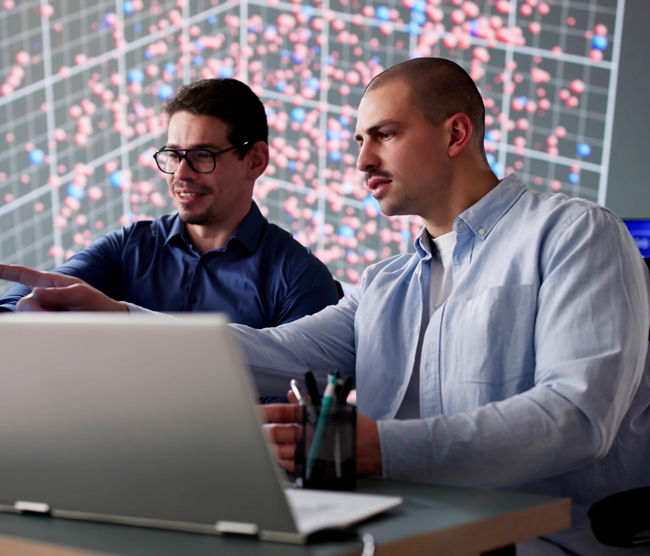 Man in cyber data team monitoring computer technology in office.   Possible professions: programmer, security monitor, software engineer, network developer.
