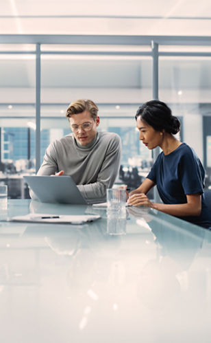 Two people at a desk