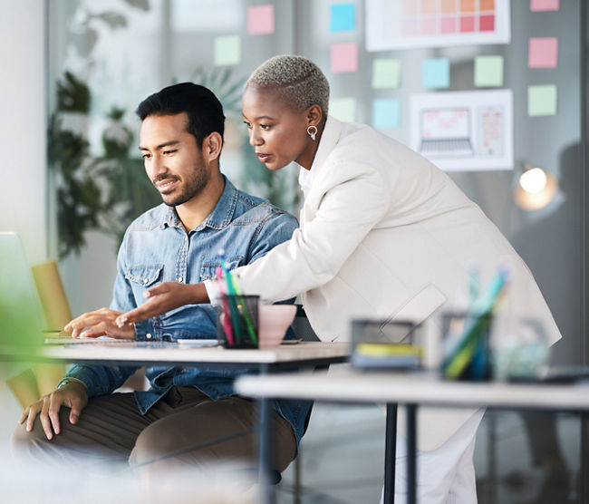 Office laptop, diversity and business people reading online report, website design feedback or research project. Collaboration, staff mentor and team designer working on company homepage development.