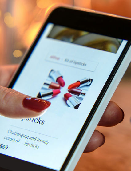 Modern Woman makes Christmas shopping via smartphone and a credit card in the e-store
