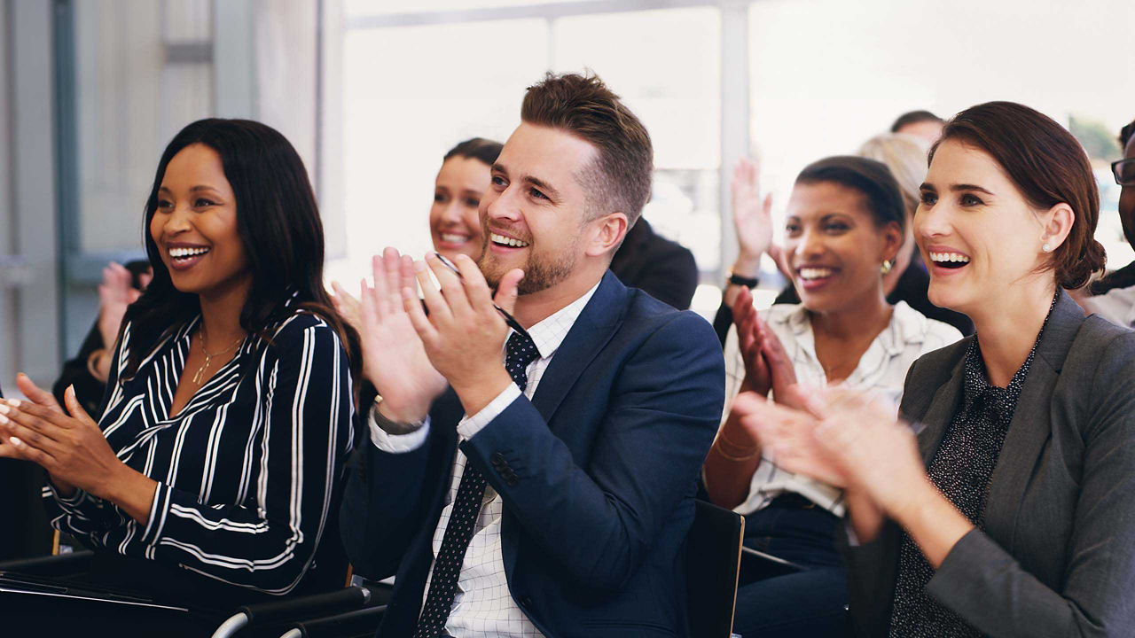 group of people clapping