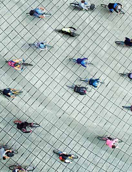 people riding their bikes
