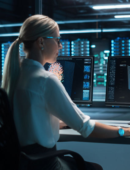 Blonde Woman Working on Her Computer with Display Shows Neural Network, Artificial Intelligence Simulation, Programming Language of Coding. Future Technologies