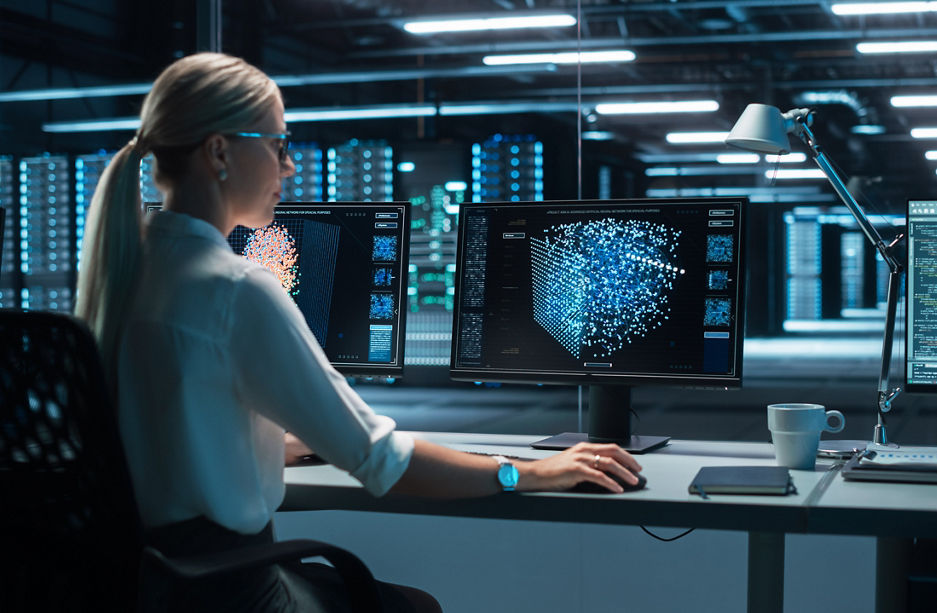 Blonde Woman Working on Her Computer with Display Shows Neural Network, Artificial Intelligence Simulation, Programming Language of Coding. Future Technologies