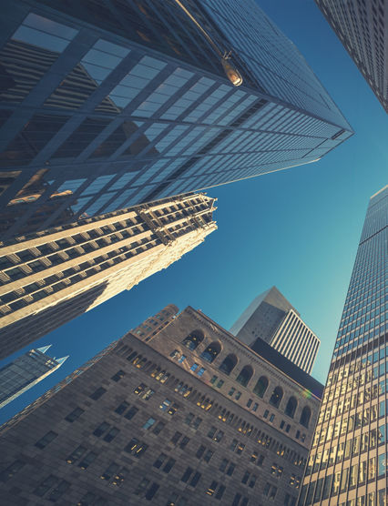 Office building top view background in retro style colors. Manhattan buildings of New York City center - Wall street