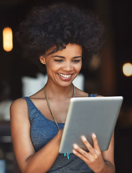 Her online orders are growing. a young woman using a digital tablet in a cafe