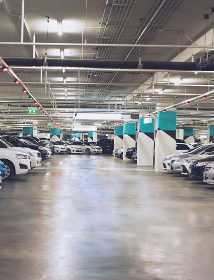 Concept sheet label write text.Cars parked in the parking lot.Open space area indoors.