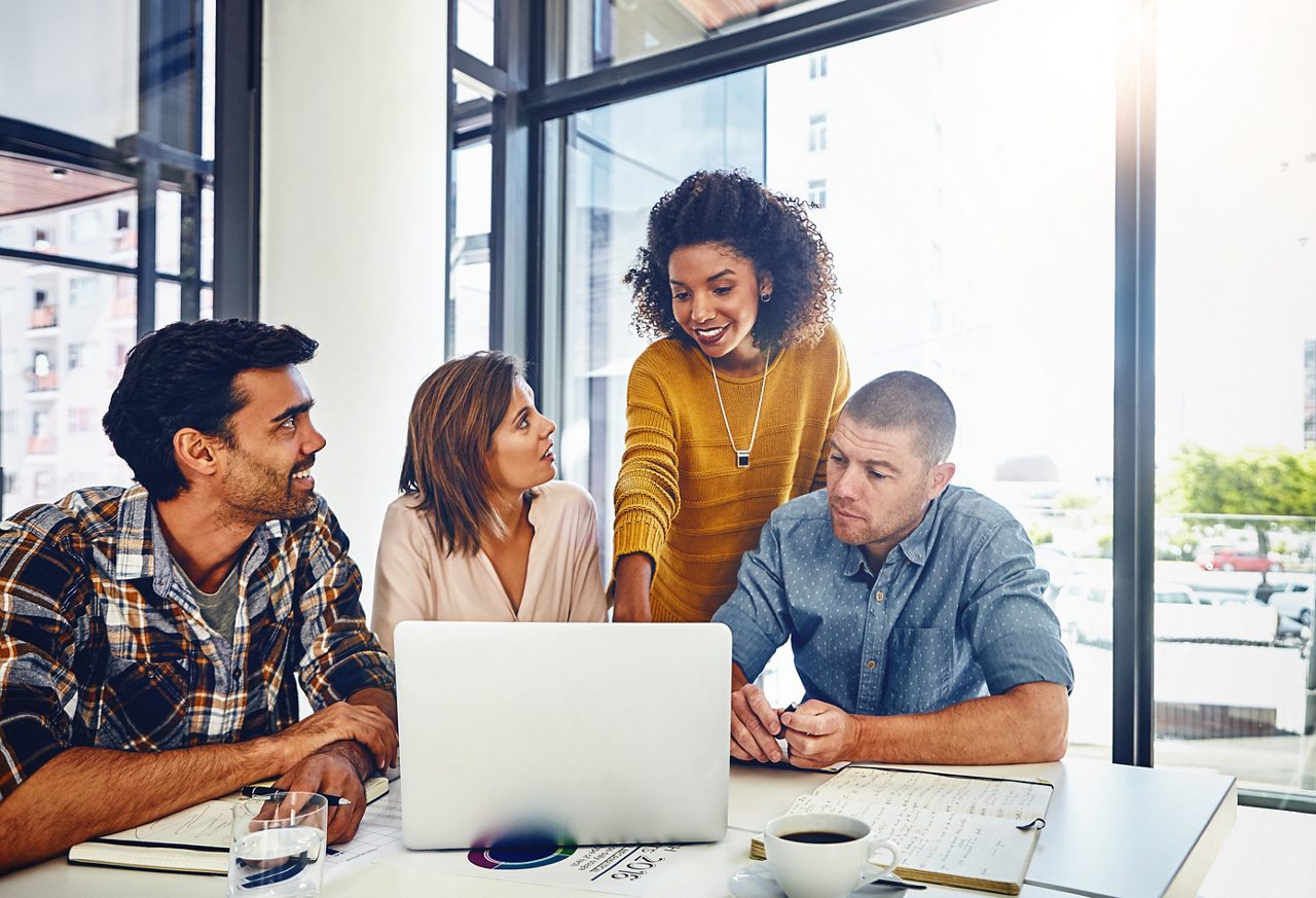 Web designer, planning and team in office with laptop, market research or problem solving in development of project. Website, design and people with technology for online marketing, SEO or strategy.