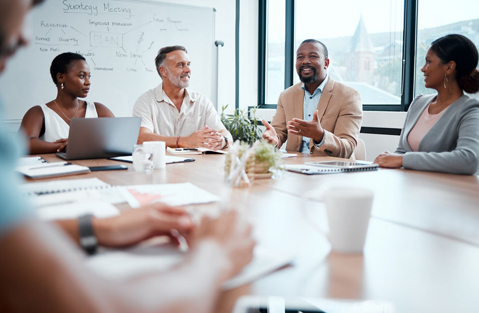 Happy business people, meeting and strategy in planning, team discussion or sharing idea at office. Group of employees in teamwork, collaboration or discussing project plan in conference at workplace.