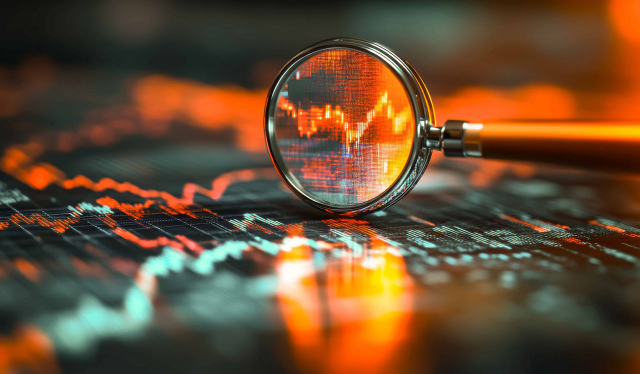 Magnifying glass analyzing volatile stock chart