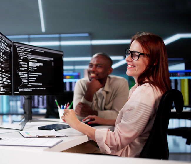 African American Programmer Woman Coding On Computer