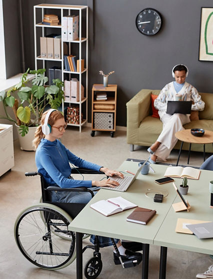 High angle view at modern office with diverse young people working at separate tasks, copy space