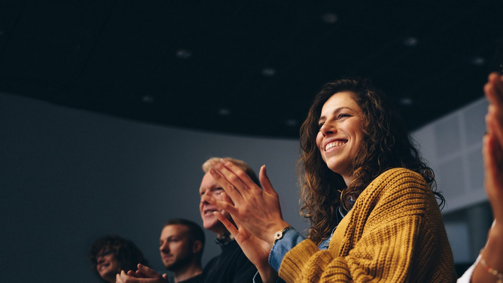 women clapping