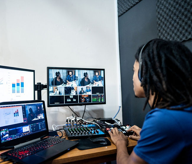 Young producer / editor at the backstage of a show