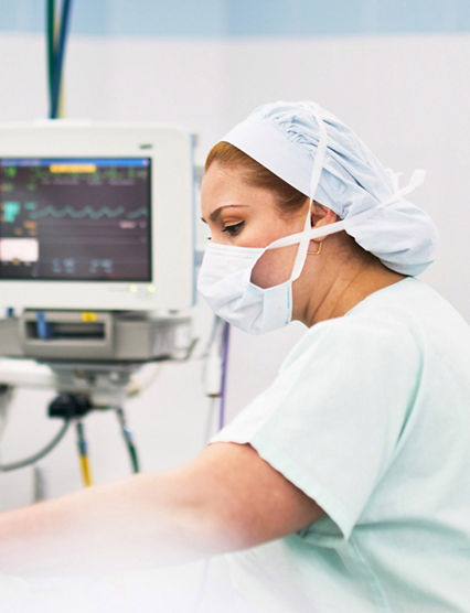 Skilled nurse preparing for an operation