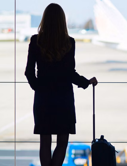 woman looking at a plane