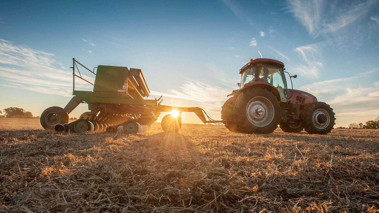tractor with a  sunset background