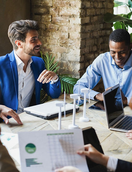 Multiracial business people working on sustainable innovation project - Focus on left man face