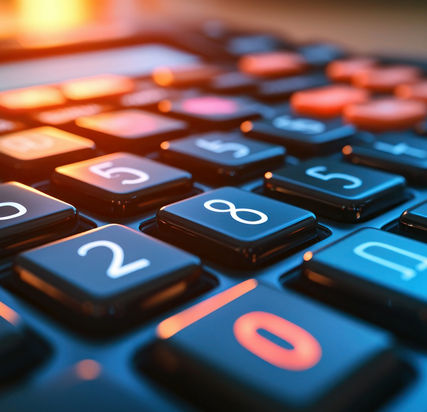 Close-up calculator keys, warm light, blurred background, for finance visuals