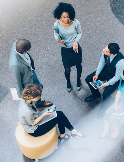Overhead view of multiracial business team having a meeting in the Office Lobby