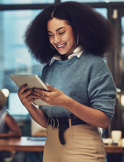 Business, tablet and night with woman in office for technology, happy and communication. Social media, connection and internet with female and search online for networking, email and website.