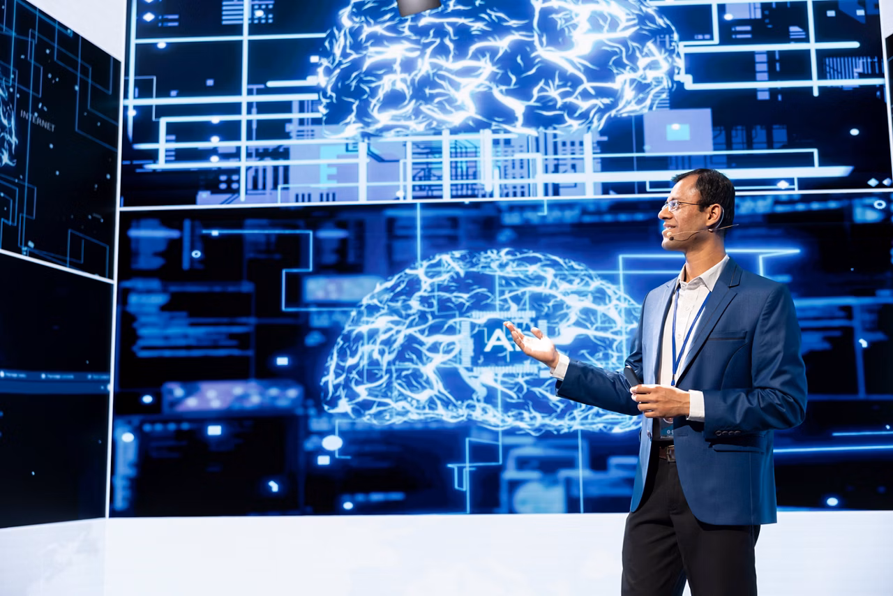 Cheerful presenter speaking at tech conference, exploring latest AI technology trends and case studies. Upbeat IT professional presenting how artificial intelligence is shaping future during event