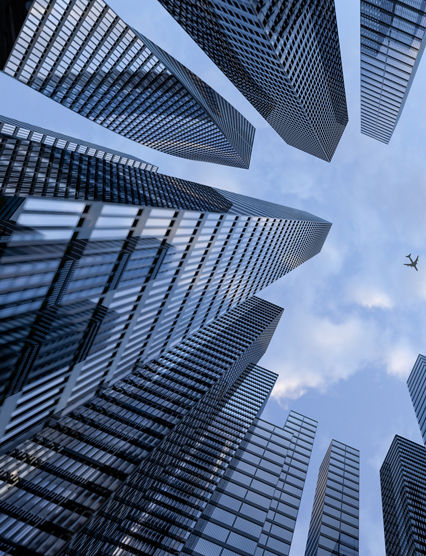 Perspective view to steel light blue of glass high rise building skyscraper city of future and airplane. Business and travel concept of industry tech architecture. 3d rendering. 3d illustration