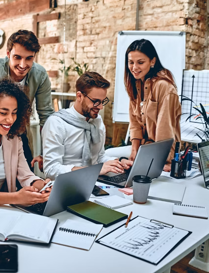Group of young multiracial business people are working in modern office. Freelancers in coworking place. Creative and stylish youth.