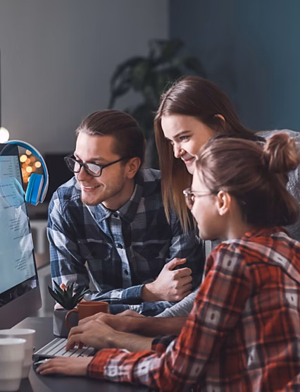 Team of programmers working in office