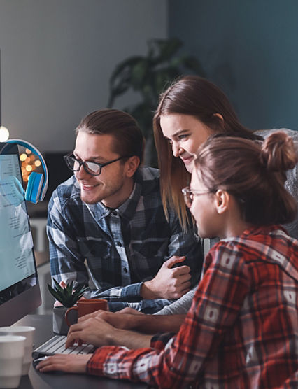 Team of programmers working in office