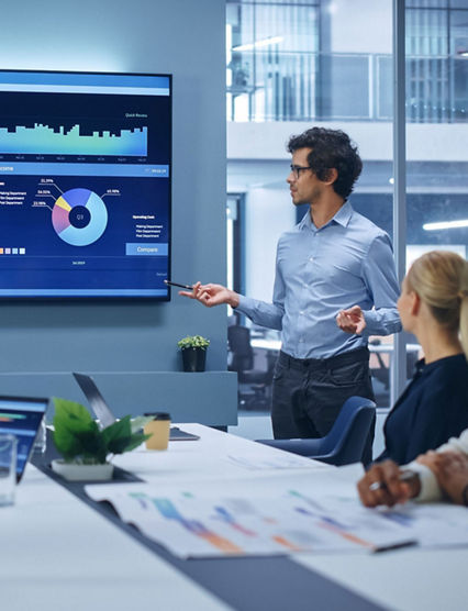 Diverse group of coworkers looking at a presentation