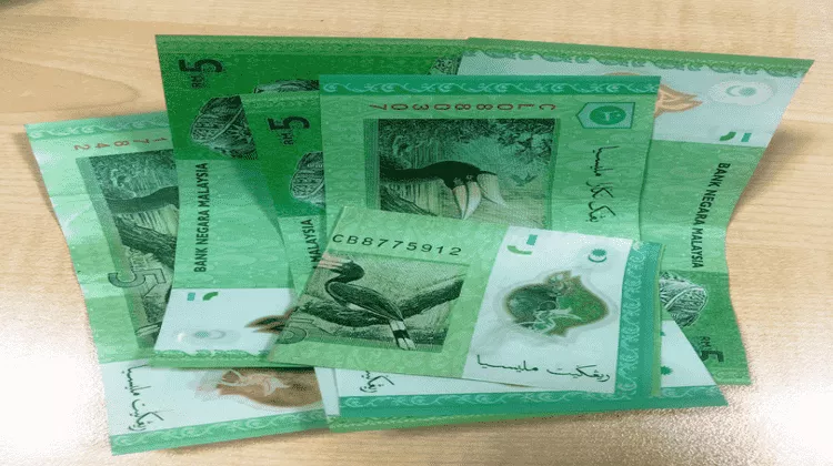 Start saving your money by keeping aside RM5 banknote in a moneybox or piggy bank