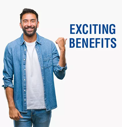 Adult hispanic man over isolated background smiling with happy face looking and pointing to the side with thumb up.