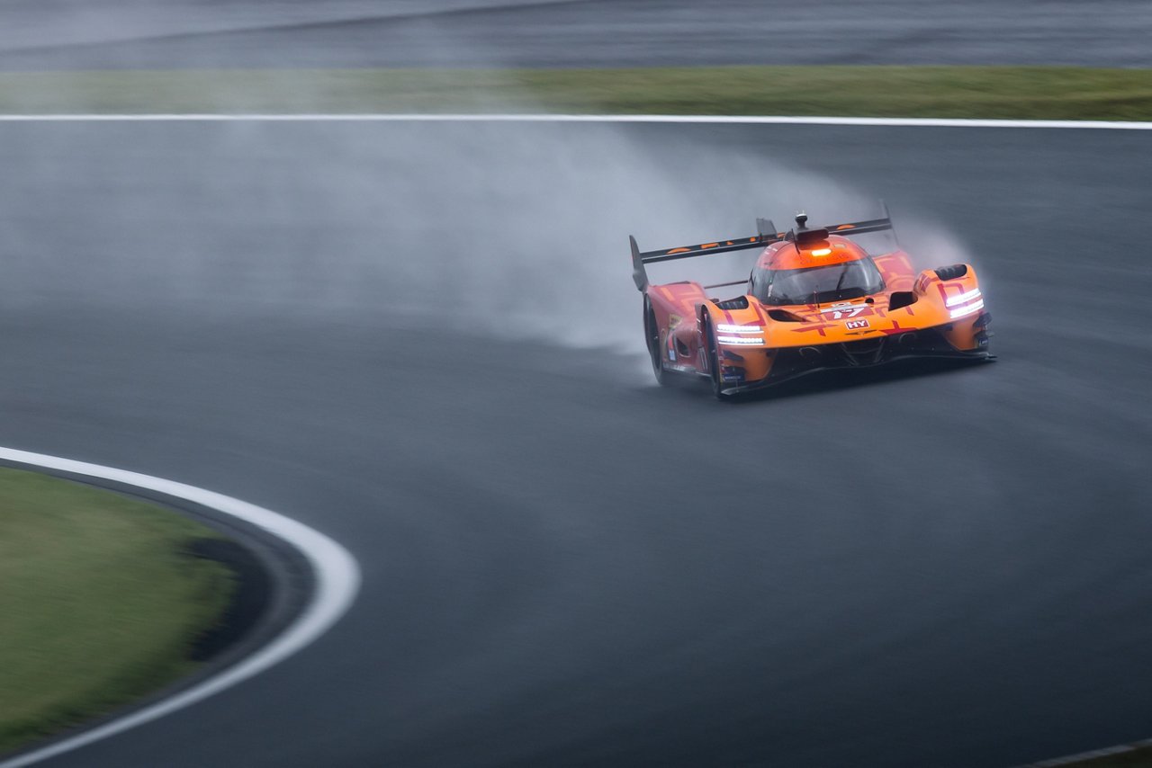 GMR-001 Hypercar cornering through heavy rain at WEC Fuji.