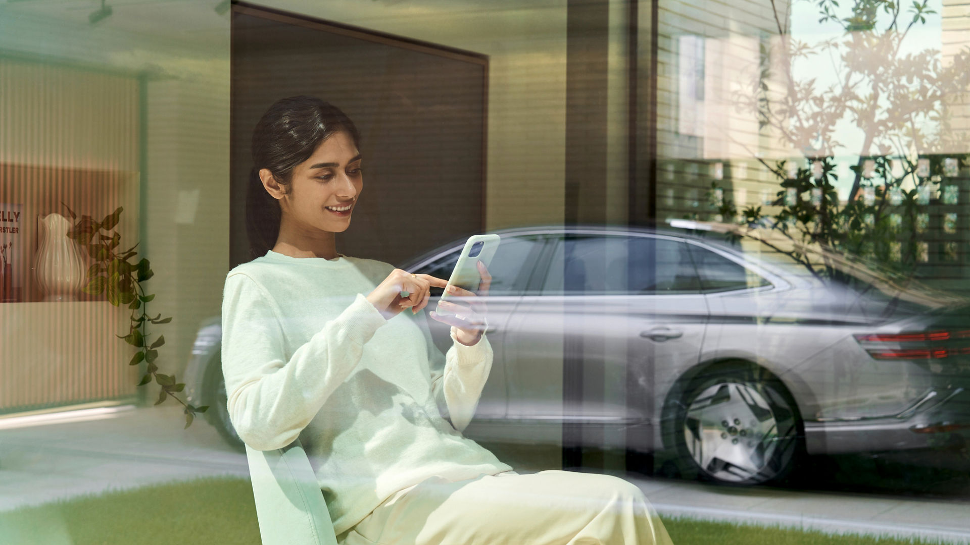 Electrified G80 luxury sedan three-quarter view showcasing its body lines and elegant electric design.