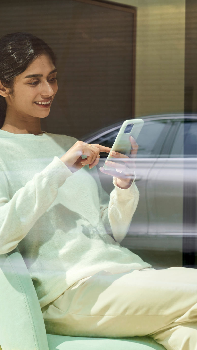 Electrified G80 luxury sedan three-quarter view showcasing its body lines and elegant electric design.