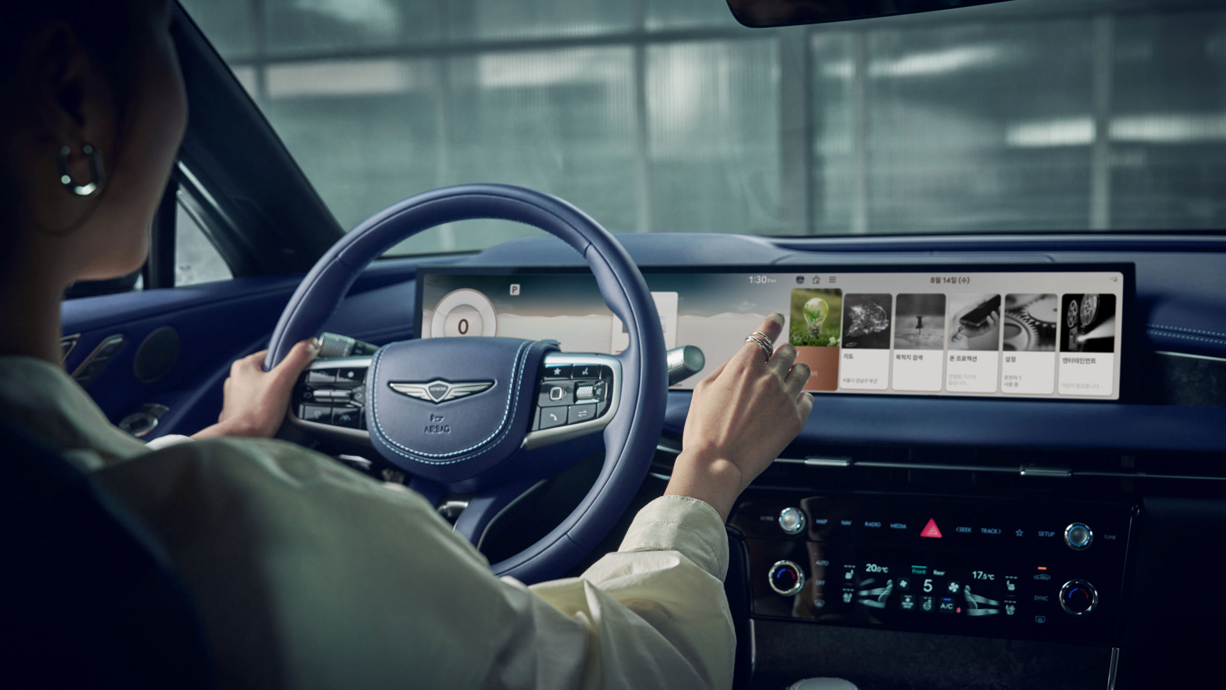 High-resolution image showcasing the unique exterior design and elements of the Genesis Electrified G80 luxury sedan.