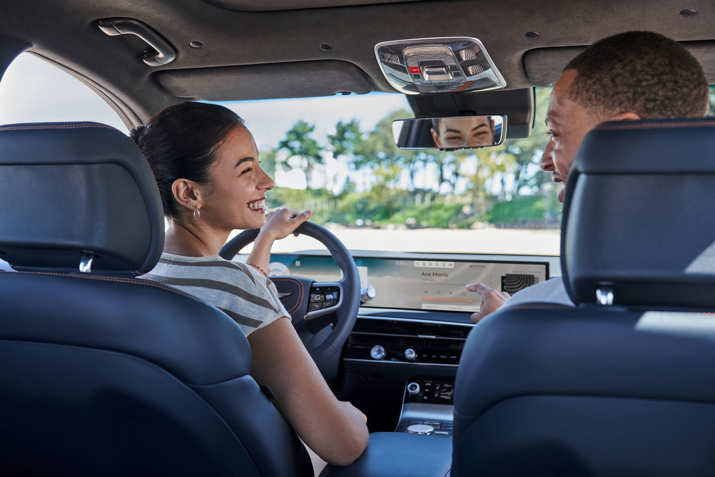 The center control panel next to the driver's seat is highlighted.