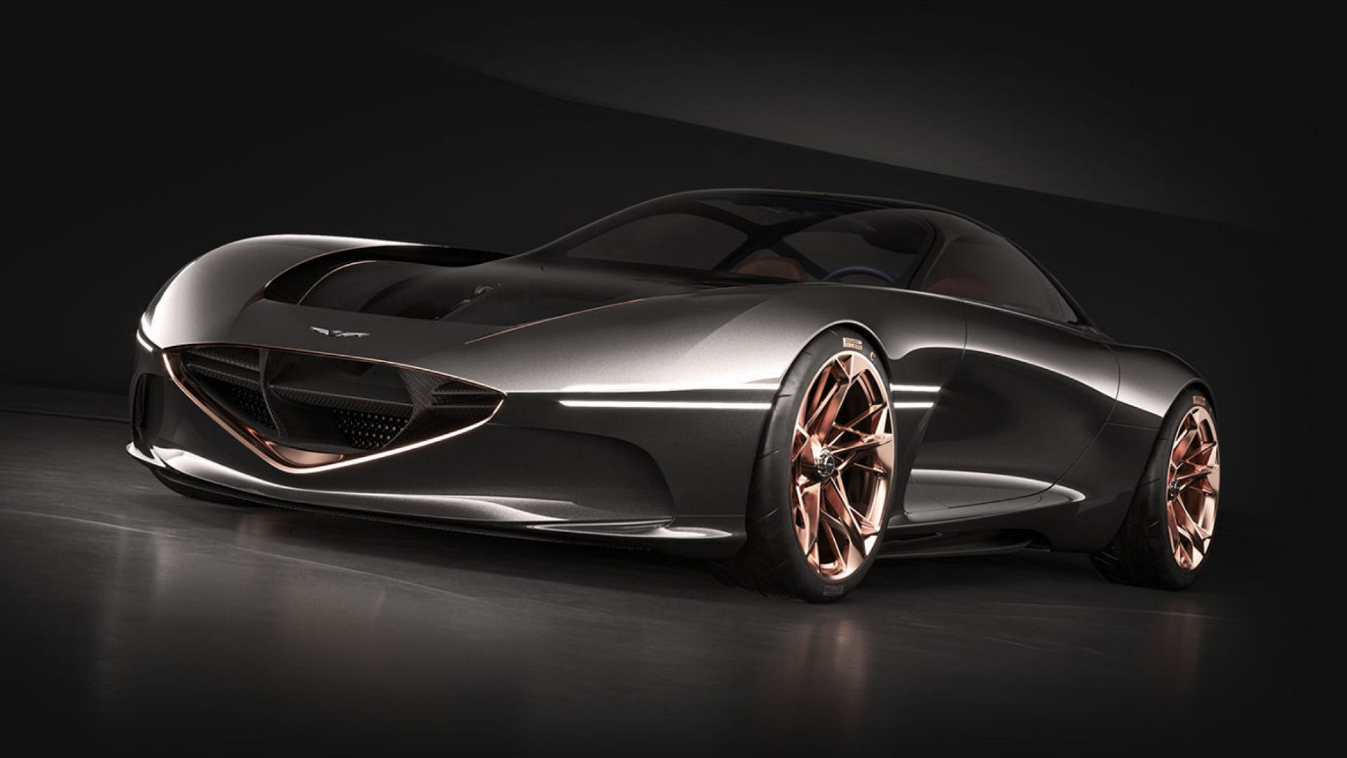 Genesis Essentia Concept car in a sleek metallic finish with copper-colored wheels, front-side view