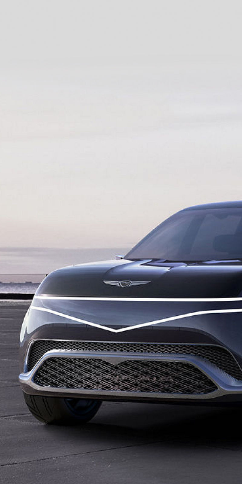 Genesis Neolun Concept SUV in front of the coast exterior front view