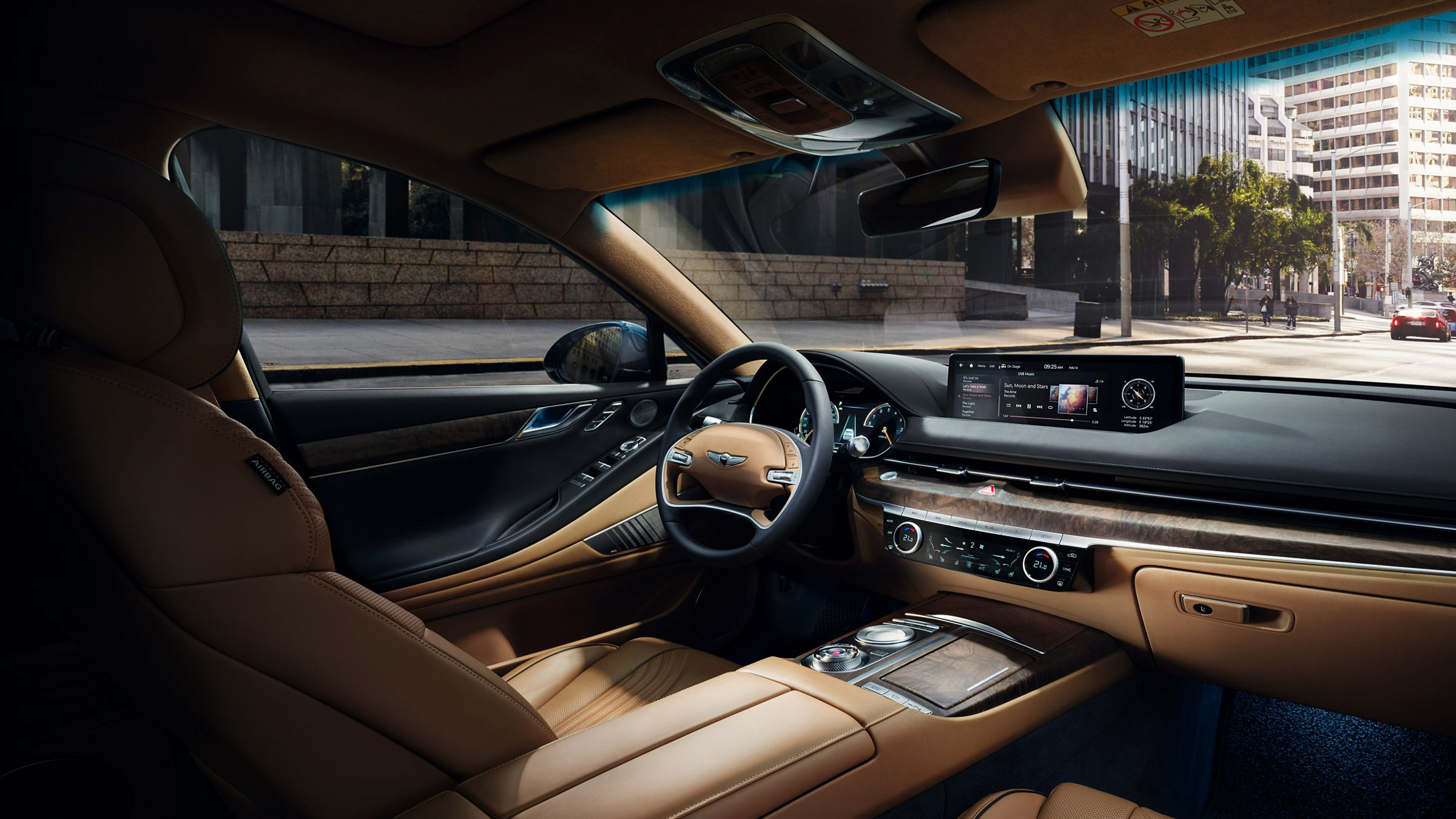 Genesis G80 front interior with brown-black dashboard