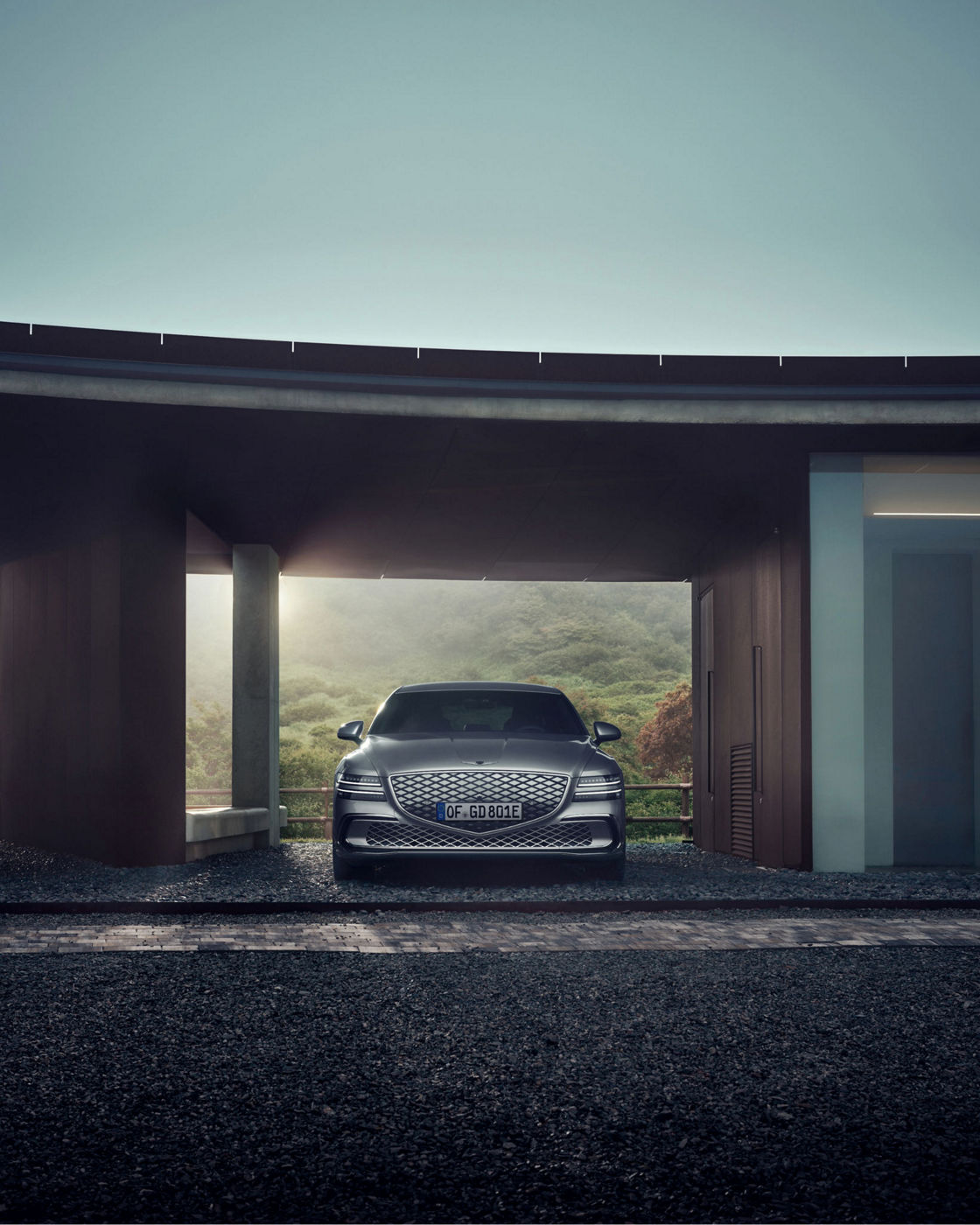 Exterior view of the Genesis Electrified G80 luxury electric sedan showcasing its design and distinctive lighting.