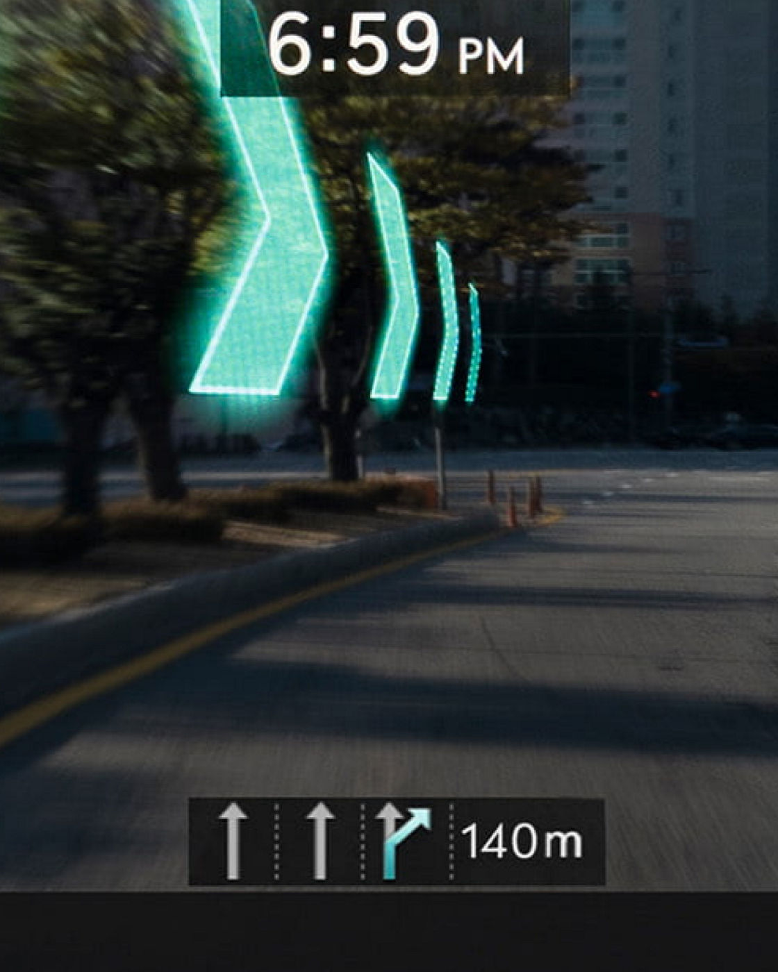 A dynamic augmented reality navigation display on the Electrified G80’s windshield, showcasing turn-by-turn directions.