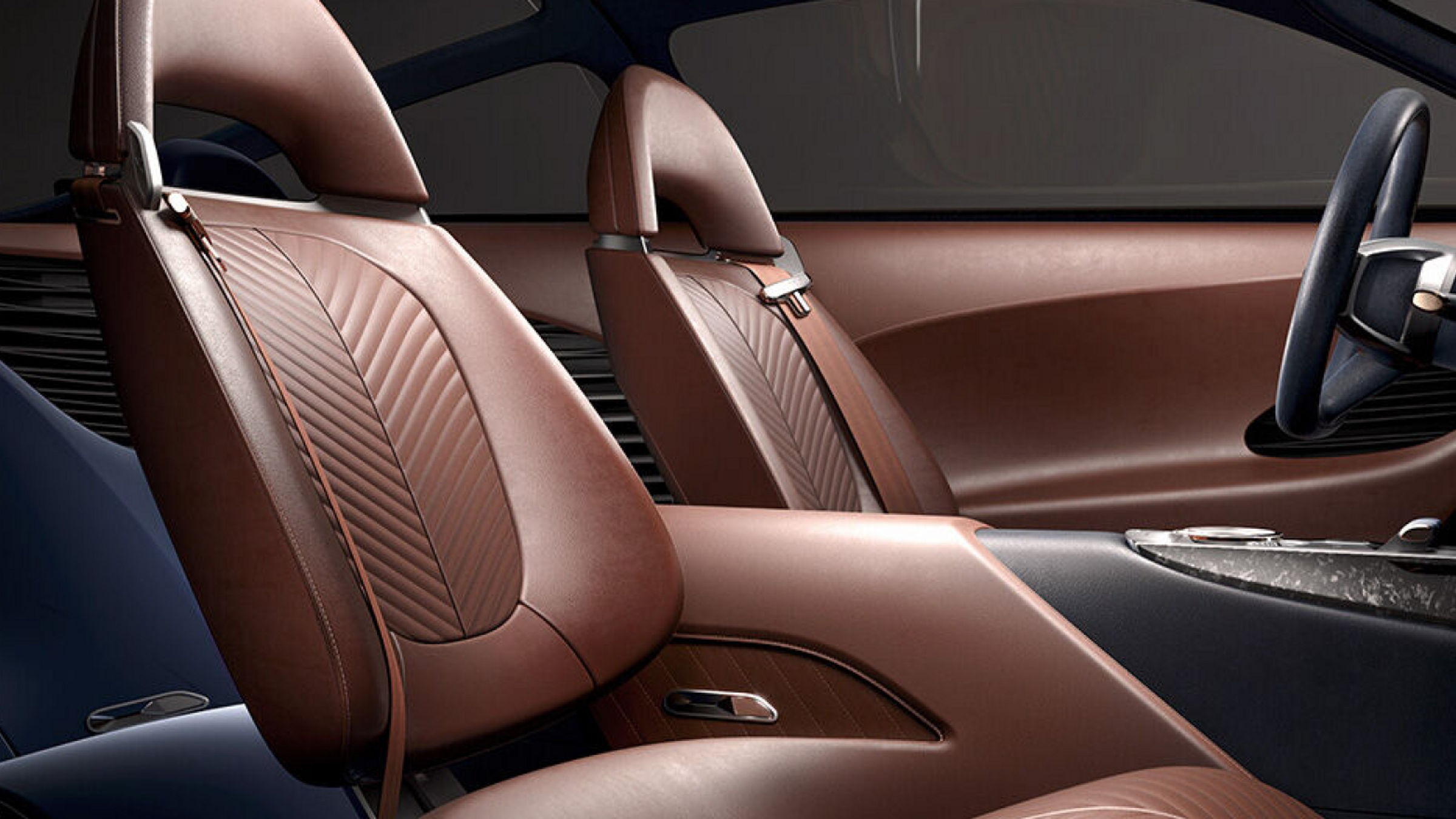 Luxurious brown leather seats in the Genesis Essentia.