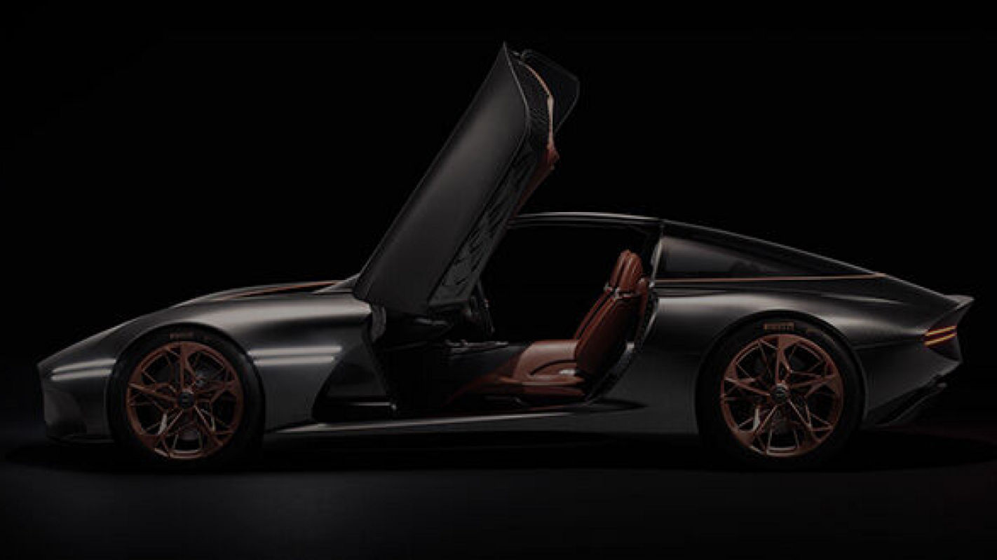 Side view of the Genesis Essentia concept car with butterfly doors open.