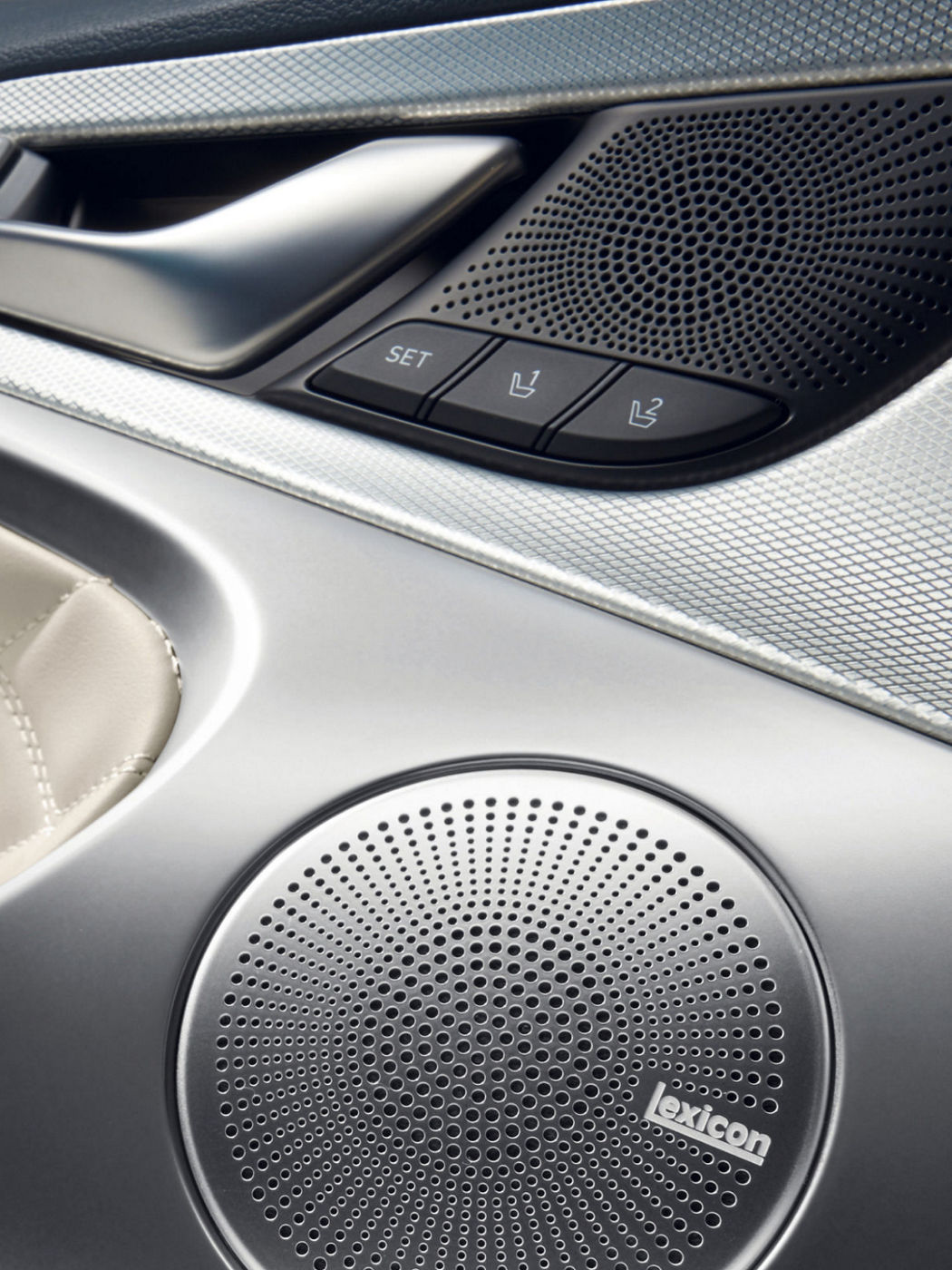 Close-up of the G70 Shooting Brake's Lexicon speaker and premium door panel, showcasing its advanced audio system and refined details.