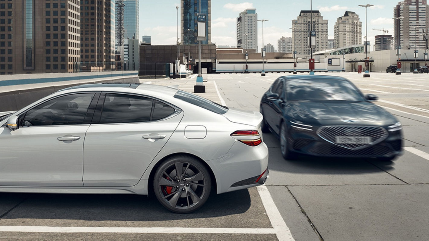 The G70 Shooting Brake in a parking lot with a city skyline in the background