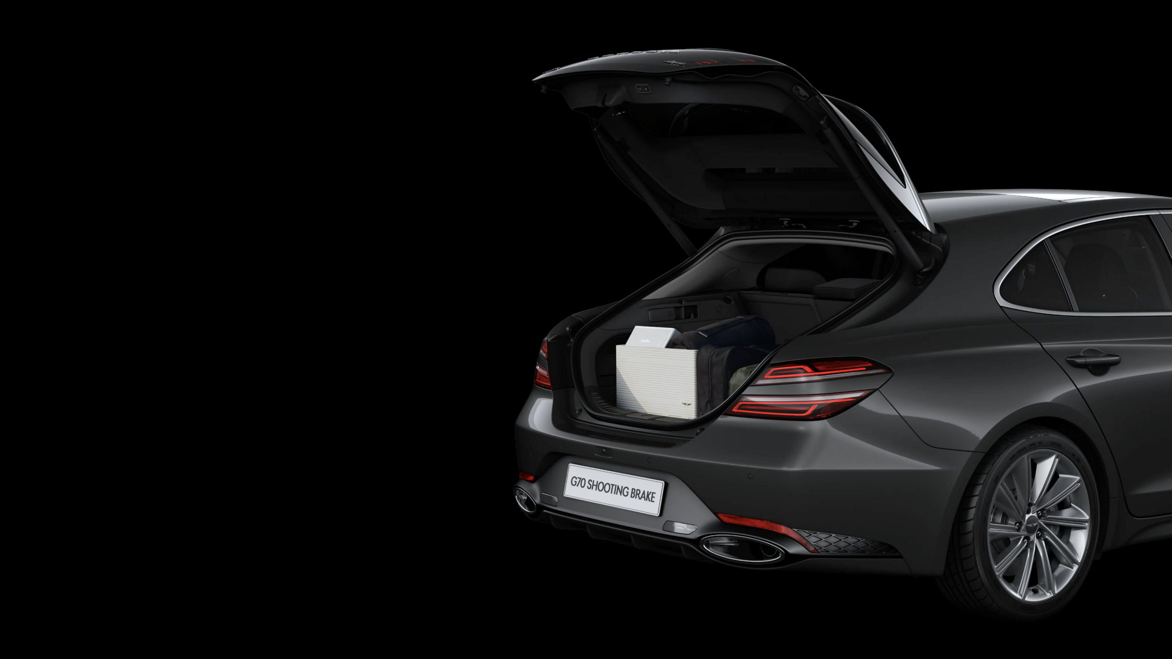 The G70 Shooting Brake with its trunk open, showcasing the ample cargo space and sleek rear design.