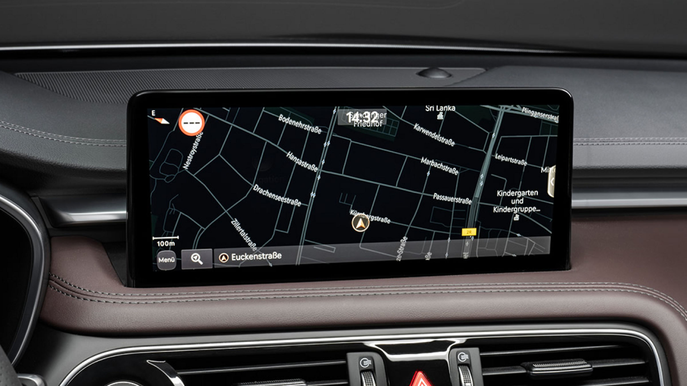 Close-up of the G70 Shooting Brake's high-resolution navigation display showing a detailed city map.